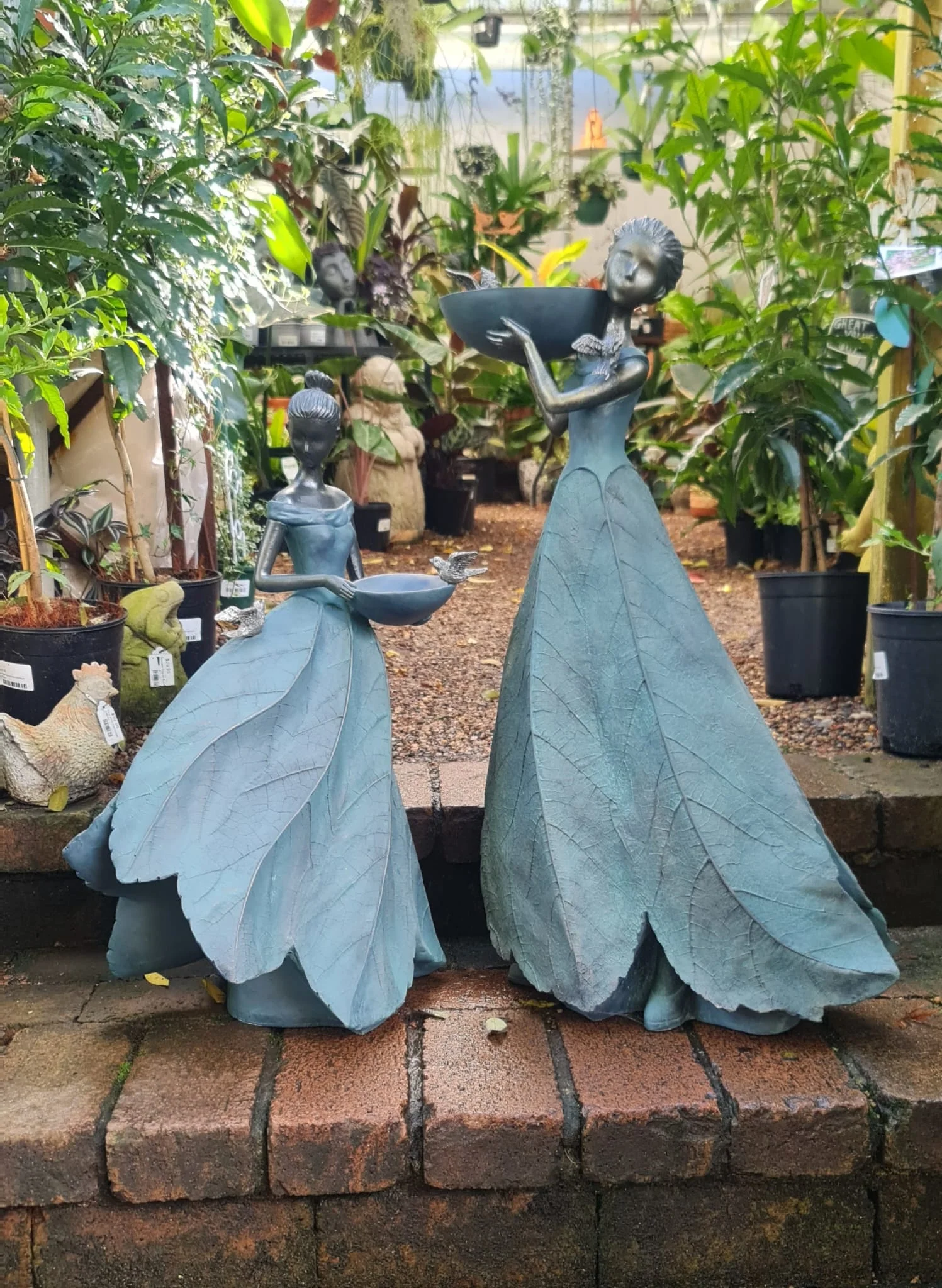 Odette Holding Birdbath On Shoulder - Image 2